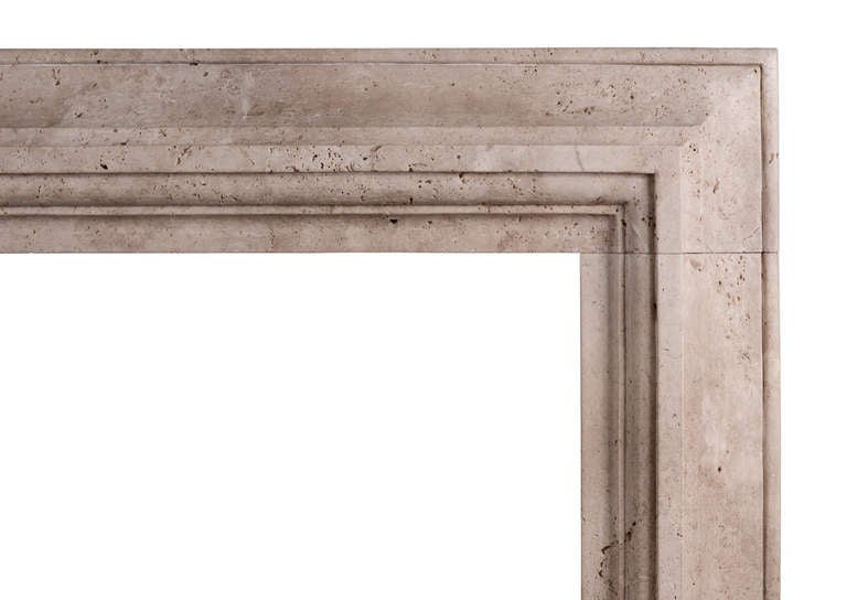 A stylish Italian fireplace in travertine stone. Moulded frieze and jambs. A copy of an original chimneypiece.

Measure: Shelf width - 1575 mm 62 in
Overall height - 1245 mm 49 in
Opening height - 997 mm 39.25 in
Opening width - 1080 mm 42.5