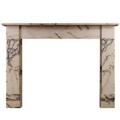 An English antique mantel piece in Italian Pavonazzo marble