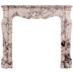 Faux-Marble Fireplace Mantel For Sale at 1stdibs For Sale on 1stdibs - This fireplace mantle is formed of a composite faux-marble exterior