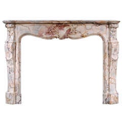 19th Century French Louis XV Style Chimneypiece in Kuros Dore Marble