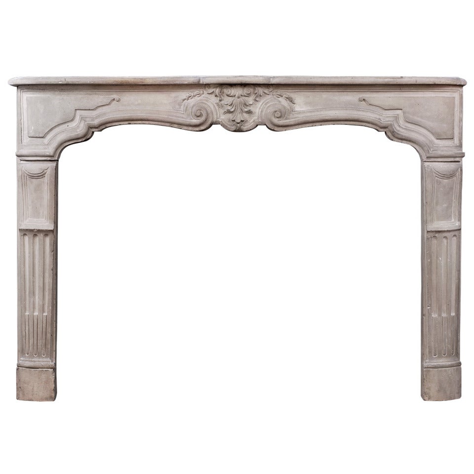 18th Century, French Louis XV Limestone Chimneypiece