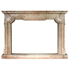 An Italian Marble Chimneypiece in the Baroque Style