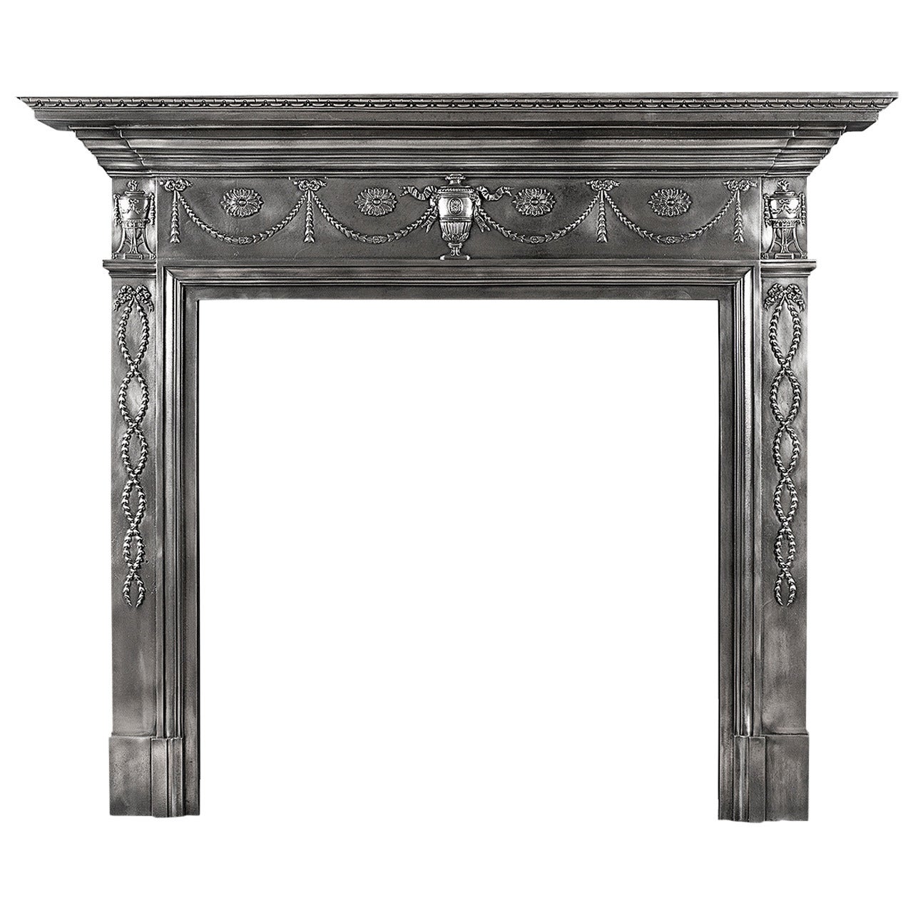 A 19th century polished cast iron fireplace mantel in the Adam style For Sale