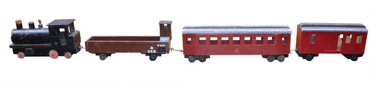 The wooden toy trains were made by anti-Nazi manufacturer Harald Ahlmann-Ohlsen (1906-1990) as an alternative to working for the German occupation forces during the Second World War.
The craftsmen working for Harald Ahlmann Ohlsen making these