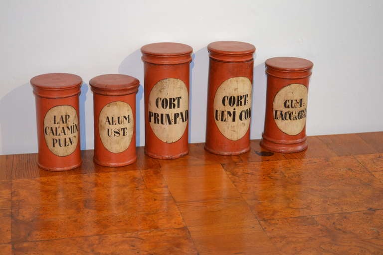 Original painted wooden apothecary jars, with Latin inscriptions.

To be sold individually:
The two larger jars are listed at Eur565/item.
The three smaller jars is listed at Eur450/item.

(Measurements: 10-10.5 cm and 16.5-23 cm).