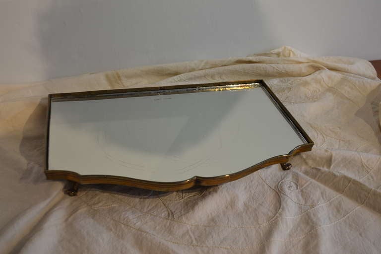 Plateau mirrors was used on the dining or dressing table, in front of guest of honor, to put flowers or candles on.
