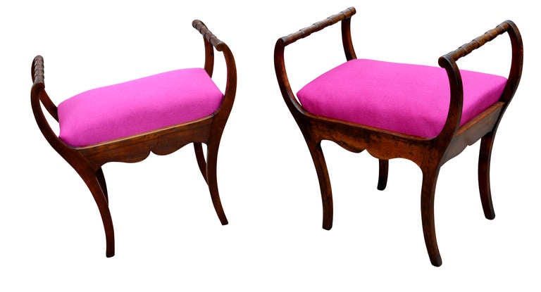 Set of two Art Nouveau stools with hot lipstick pink seats.