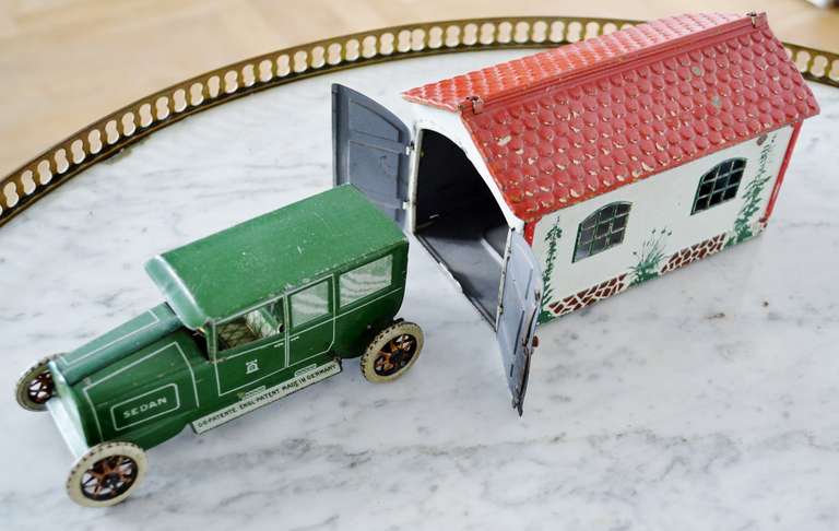 Metal 20th Century Green Lehmann Toy Sedan with its Garage