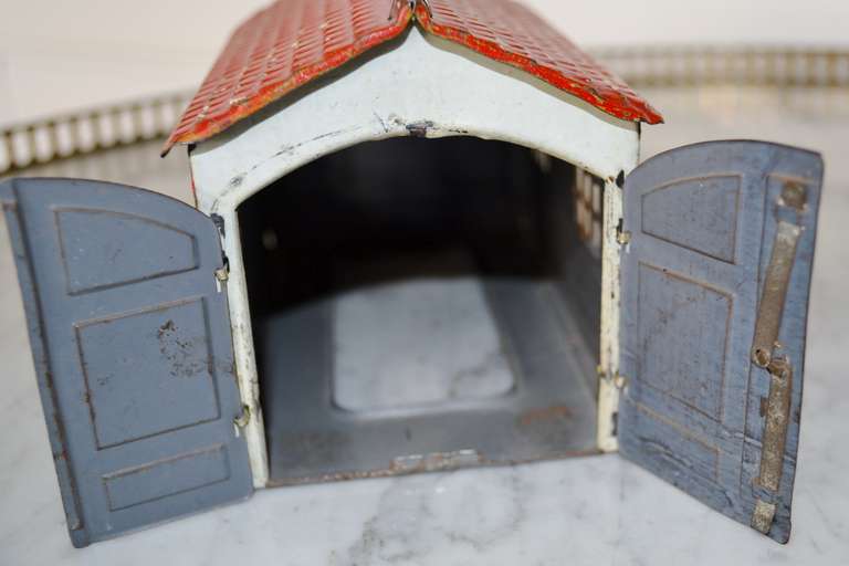 20th Century Green Lehmann Toy Sedan with its Garage 4