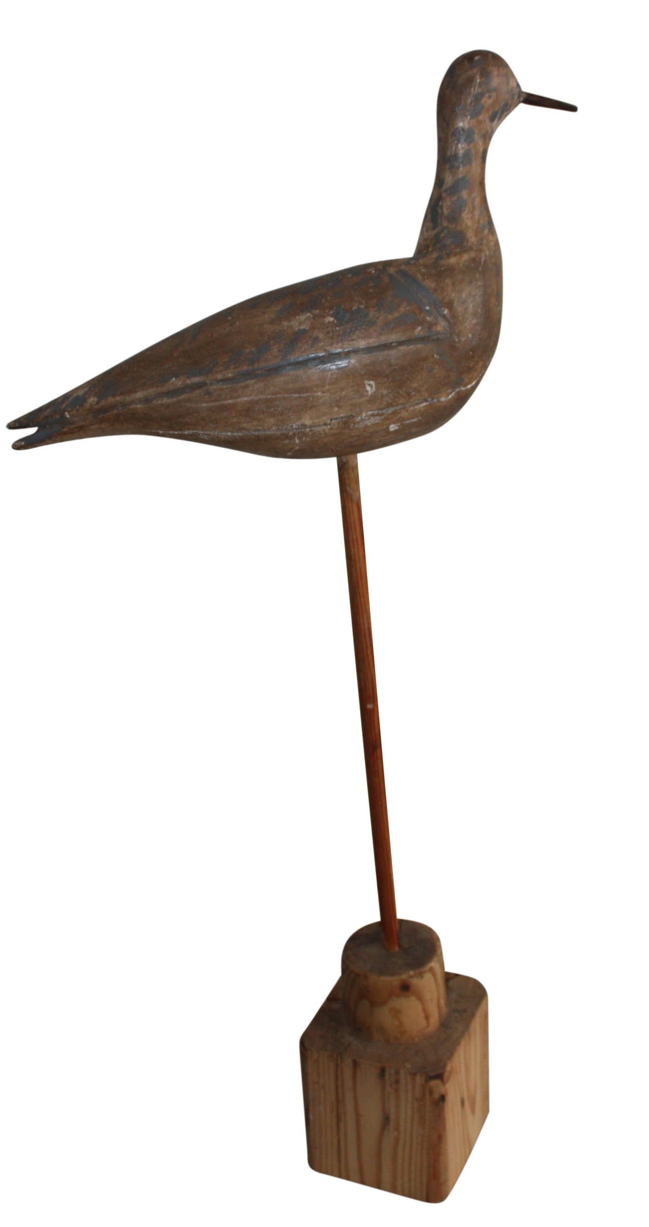 Very nice wood decoy, carved and painted as a grouse. Placed on a stick and wooden base.