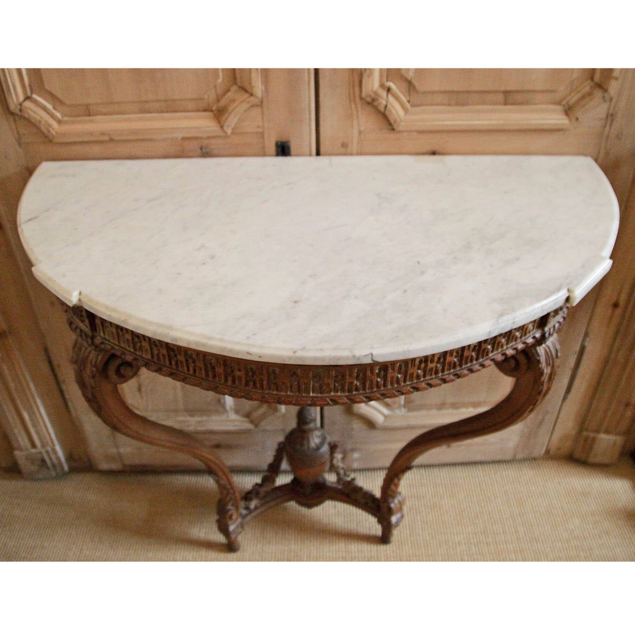 Wonderful Louis Seize Console.
Walnut with filigrane wood carvings and marble top.
