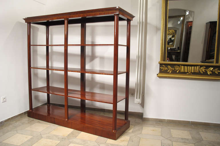 Elegant Viennese Biedermeier Etagere from 1820. The Etagere is mahogany veneered and designed in the style of Danhauser. The Etagere is in very good condition
