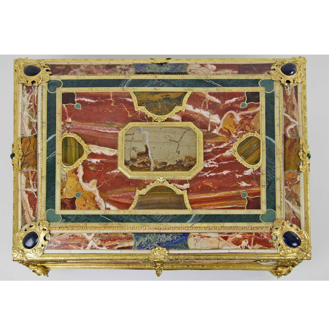 Stunning Dokument Casket with marble and semi-precious stones occupied and fire gilded bronze ornaments, mid-19th Century.
Restored under use old parts.
Corpus spruce with various marble and semi-precious stone (jasper, lazurite, malachite)