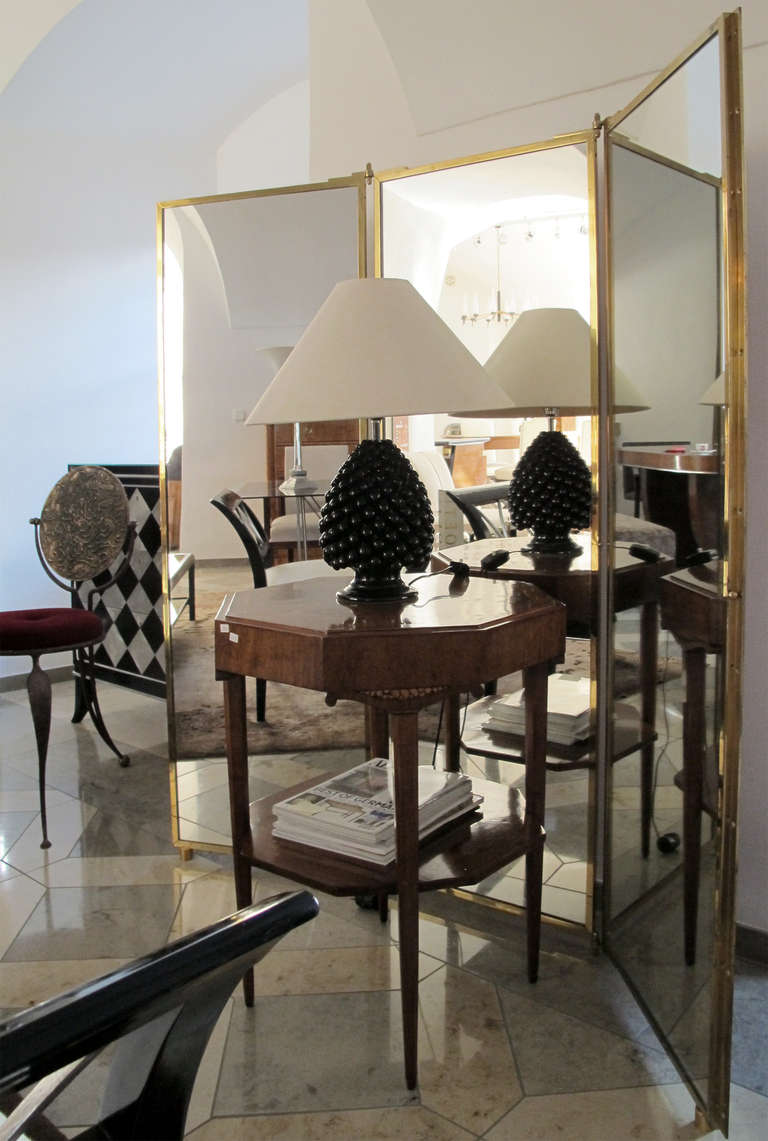 'Miroir Brot', very elegant folding tryptich wall mounted mirror from the Yves Saint Laurent shop in Vichy, France. It was made by the famous Paris makers Brot. The mirror is in excellent and fully working condition.