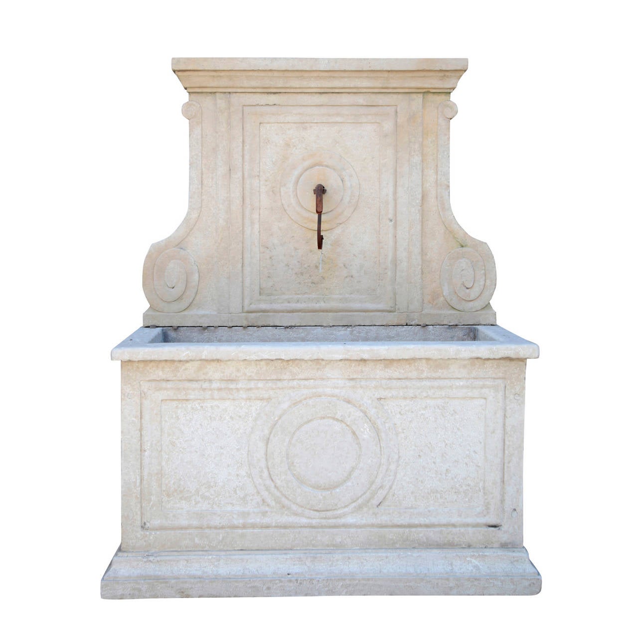 Wall Fountain from the 20th Century out of Marble giallo d'Istria from southern Europe. The transverse rectangular basin stands on a slightly projecting base. The real panel is decorated with architectural elements and clear, classicistic lines.