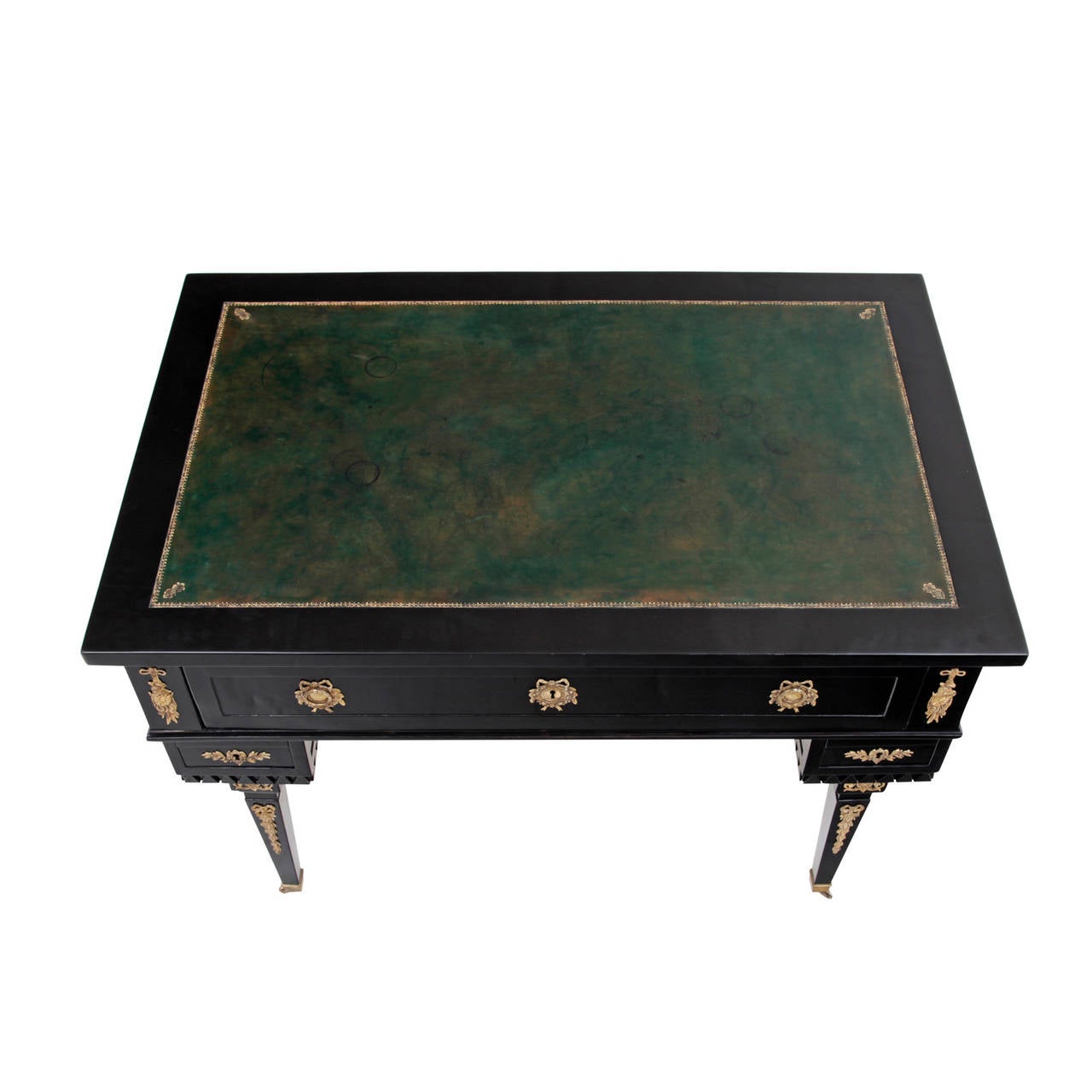 Elegant Bohemia Classicist Writing Desk from the early 19th Century.
The desk is completely ebonised and has a green leather writing top. It stands on four tapered legs with wheels and has one drawer on each side and a broader drawer beneath the