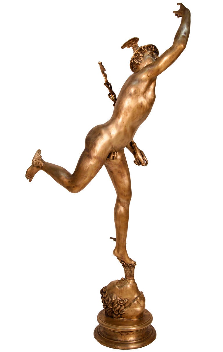 19th/20th century bronze statue depicting the flying Mercury. The bronze is adapted from the version of Giambologna's Mercury in the Louvre.