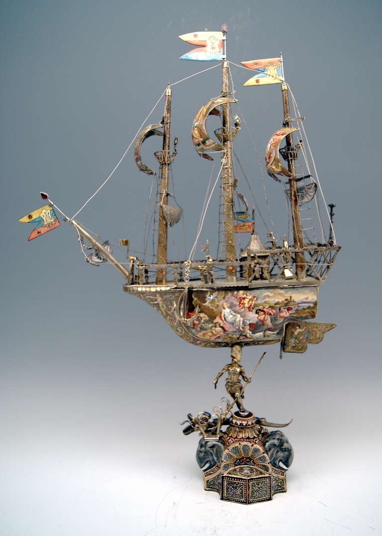 Gorgeous as well as rarest vintage  SILVER SAILING SHIP  abundantly decorated with STUNNING ENAMEL PAINTINGS depicting MYTHOLOGICAL SCENES deriving from ancient times:  For example there is god  POSEIDON  (NEPTUN)  wearing trident visible,
