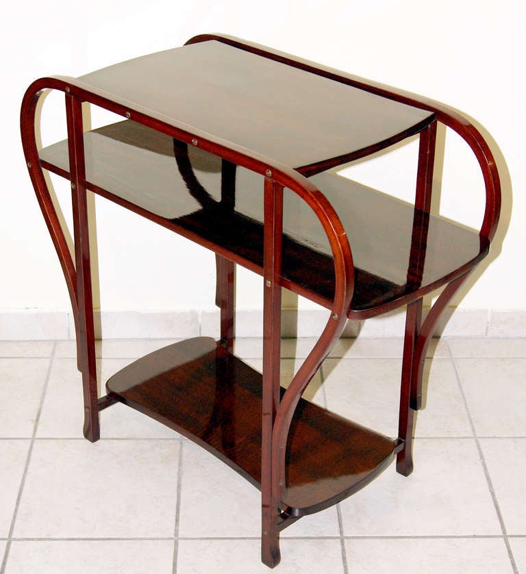 Thonet Tea Table  /  number 31
made by Thonet  (Vienna),  designed  circa  1900/05
height:  30.71  inches  |   width: 32.28  inches   |   depth:  15.75 inches
BEECH WOOD, STAINED TO MAHOGANY
refurbished by hand

Excellent table of most elegant