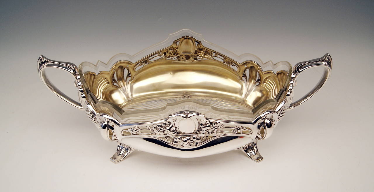 Silver German Huge Flower Bowl / Centrepiece with Original Glass Liner, made by BRUCKMANN (GERMANY).

Art Nouveau Period (made circa 1900)
SILVER 800
branded by German Crescent with Crown
MANUFACTORY: 
Eagle Mark of Bruckmann & Söhne ( =