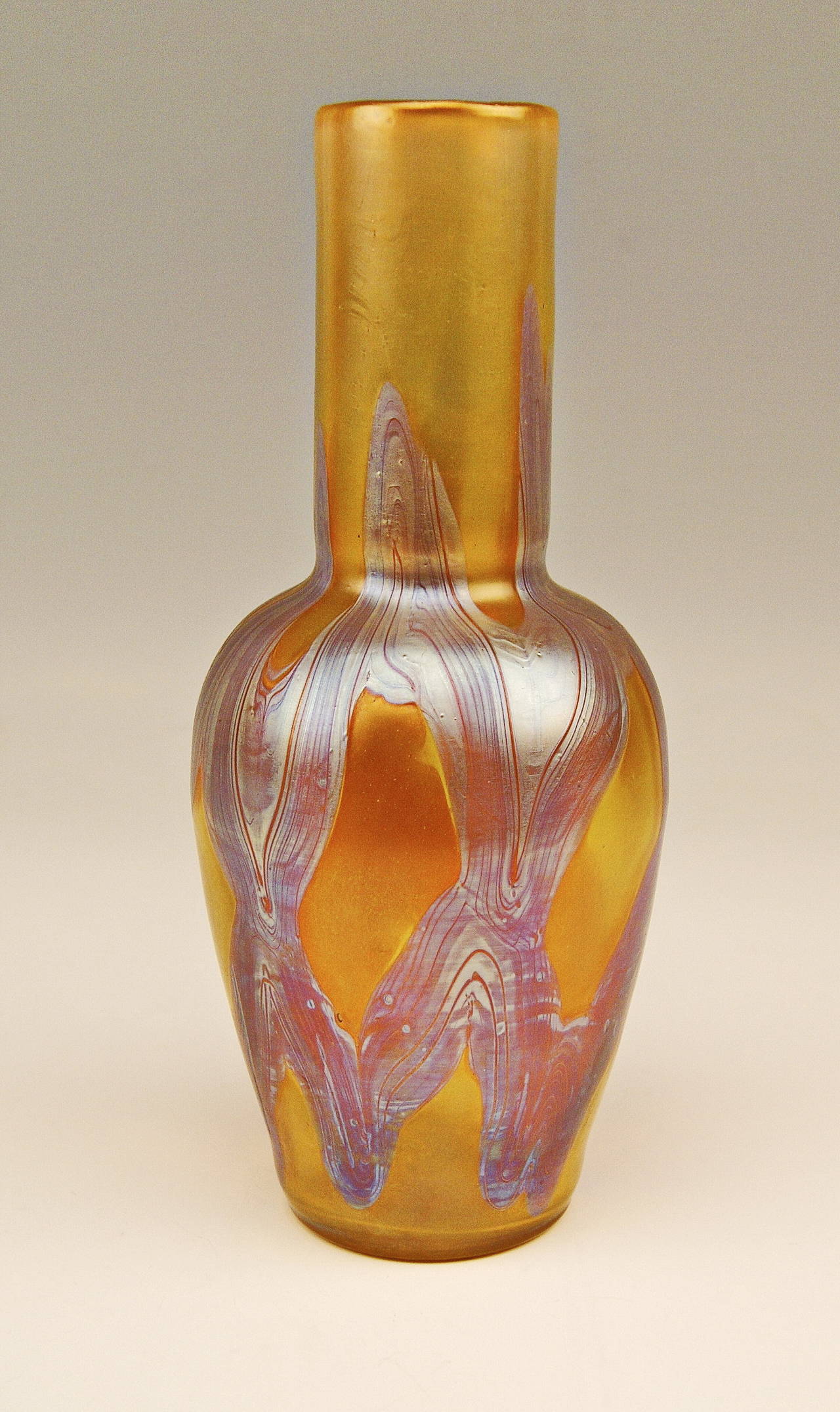 Vase Loetz Widow Klostermuehle Bohemia Art Nouveau 

Made by Loetz, Klostermühle   circa  1900
Decor:   Phaenomen

This finest Loetz Art Nouveau Vase is of stalky as well as of bellied form type. 
The vase made of colourless glass has round