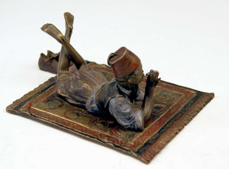 Vienna Bronze Made by Franz Ber(g)man(n) Arab Boy on Carpet  c. 1900 - 10