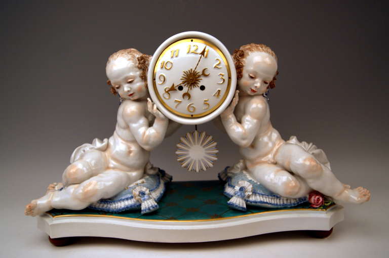 MEISSEN TALL RARE MANTLE CLOCK CREATED BY  PAUL SCHEURICH   (1919)
 MADE DURING PFEIFFER PERIOD  (1924 - 34)  WHICH IS WELL KNOWN FOR MANUFACTURING OF HIGHEST QUALITY MEISSEN ITEMS  !
 MEISSEN BLUE SWORD MARK WITH POMMELS ON HILTS  (underglazed)
