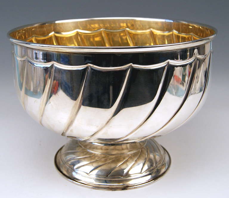 Italian huge silver champagne cooler gilded inside. Diameter 14 Inches
 
Excellently made huge bowl standing on round foot.  The bowl's wall is accentuated by many vertical lines covering surface in very interesting manner. The inner side of