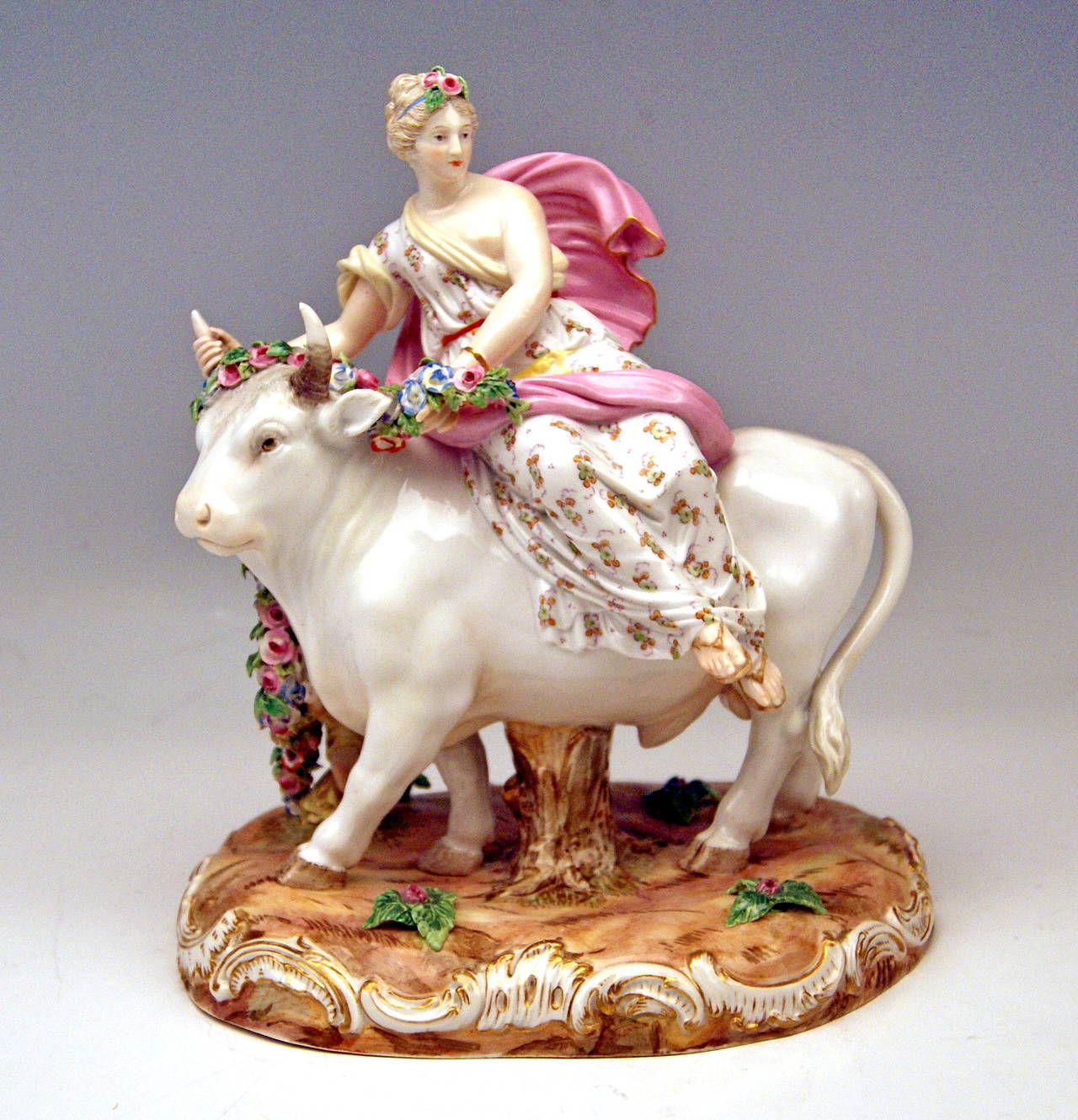 Meissen Gorgeous Figurine Group: 
Europe Riding on a White Bull or Rape of Europe

manufactured circa 1880

Specifications: Europe is sitting on the huge bull which is metamorphosed Greek God Zeus who had fallen in love with her  (for this