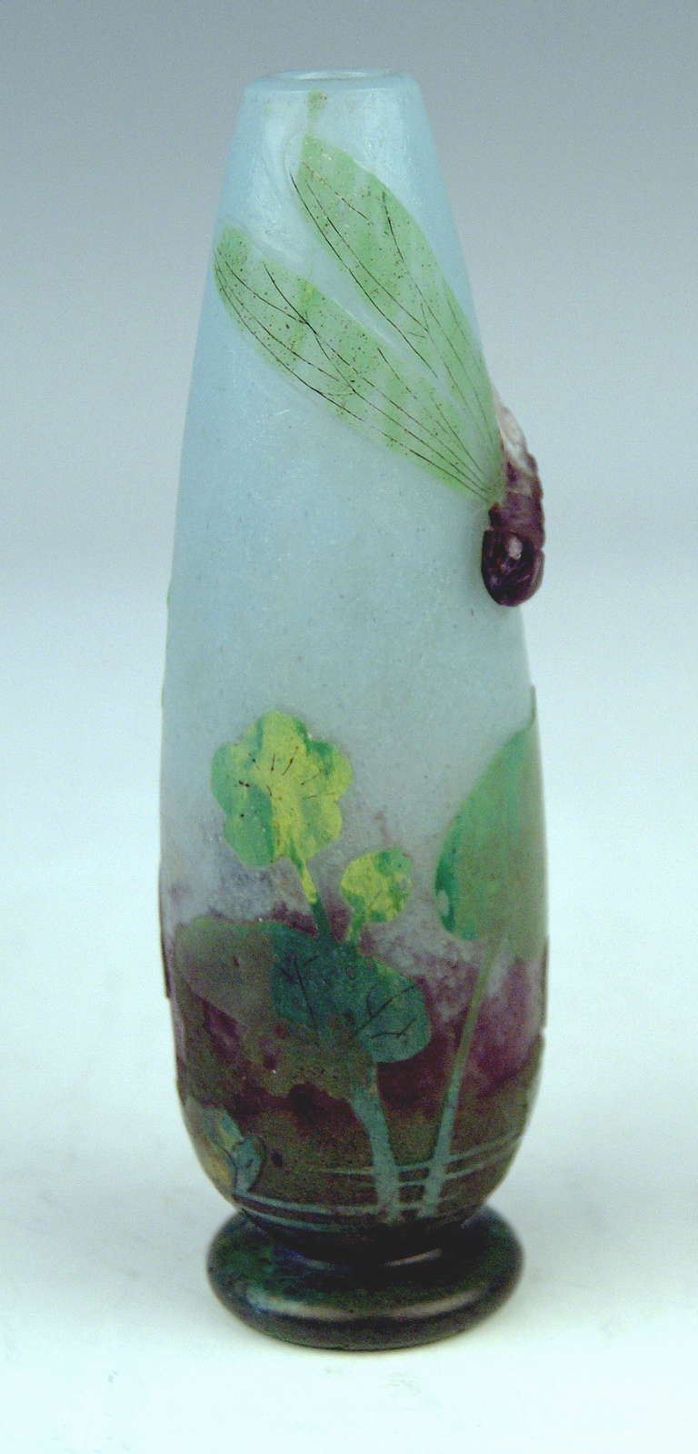 Daum Nancy Vase called Libellules et Renoncules Jaunes (Art Nouveau), made in France / Lorraine, circa 1904
 Stunningly manufactured casing glass:  With  milky bluish opalescent powder meltings at top area as well as at middle area  /  the powder