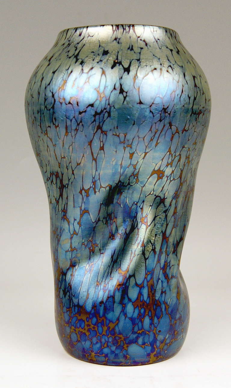 Manufactory:  

Loetz Widow  Klostermuehle  (bohemia or Old Imperial Austria)  

Circa  1900-1905

Decor:  Cobalt Papillon

Period: Art Nouveau  

This stunning Loetz Vase is of bellied oblong  and tapering form type having some