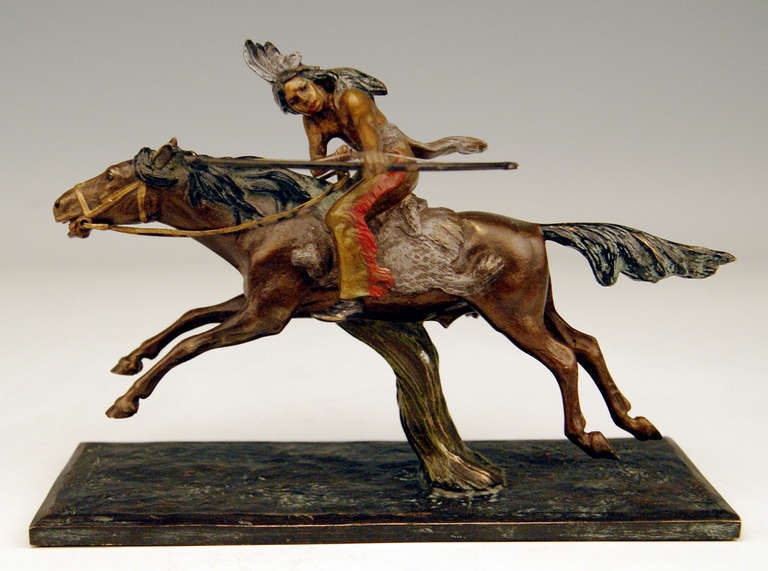 Gorgeous Vienna Bronze figurine created by famous bronze sculptor Carl Kauba  (1865 - 1922). Made circa 1910. 

There is a riding red Indian with a bow and arrow visible, being busy while hunting. The Red Indian man sits on galloping horse, he is