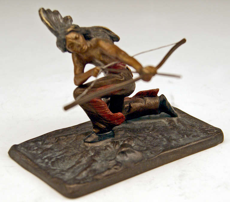 Gorgeous Vienna Bronze figurine created by famous bronze sculptor Carl Kauba (1865 - 1922). Made circa 1910. 
There is a Red Indian visible, being busy with hunting. He is armed with bow and arrow. The Indian warrior is going to discharge the arrow.