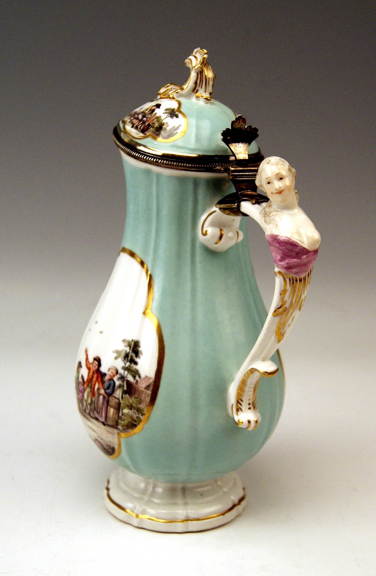 Meissen gorgeous as well as rare LIDDED COFFEE POT.
  
DATING:     
ROCOCO PERIOD    MADE FIRST HALF OF 18th CENTURY  
(before 1750-56)
MATERIAL:   
white porcelain, glossy finish, finest multicolored painting (figural type)
TECHNIQUE: