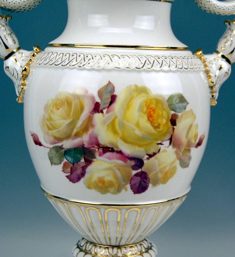 MEISSEN TALL SNAKE HANDLES VASE WITH FINEST FLOWER PAINTING 
c. 1870

MANUFACTORY:  MEISSEN 
DATING:  MADE SECOND HALF OF 19TH CENTURY  /  CIRCA 1870 
MATERIAL:      
WHITE AND GOLDEN PAINTED  PORCELAIN, GLOSSY FINISH, FINEST PAINTING