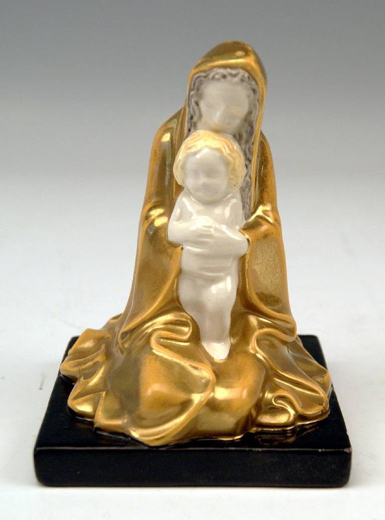 most remarkable figurine Madonna  /  Virgin Mary with Christ Child  circa 1907-1908
modeled by Michael Powolny   (1871 - 1954)    /   circa 1907

hallmarked:
manufactured by  Wiener Keramik   
(Vienna Ceramics  /  hallmarked)
material is 