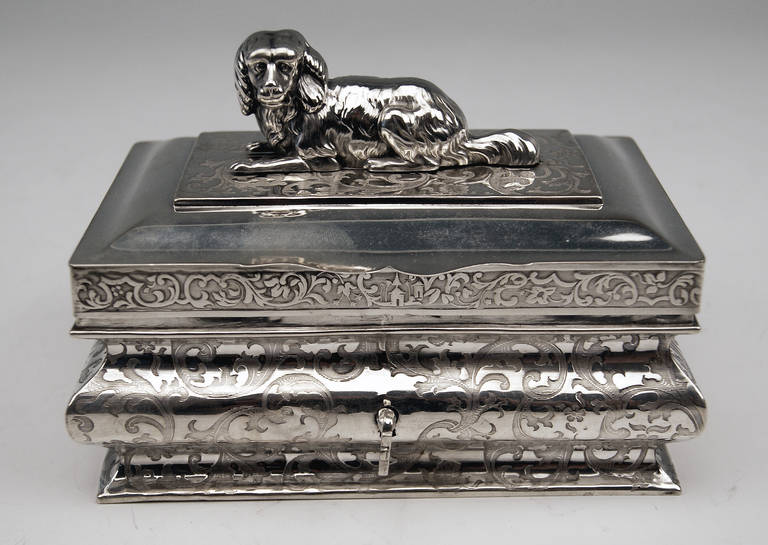 German  gorgeous Silver Sugar Box 
made second quarter of 19th century   

 Excellently made sugar box  /  sugar chest of rectangular shape with bulged outer wall of squeezed form type. The chest has a slightly domed lid to which a quite large