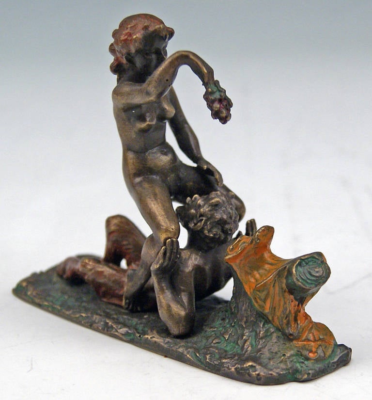 Gorgeous Vienna Bronze Erotic Figurine Group:  
Faun - male figurine - accompanied by female nude.
 Made by famous Austrian manufactory Bergman(n),  circa 1890  (hallmarked)  /  signature B  (BERGMAN(N)'S FIRM SIGN)  is visible at reverse side of