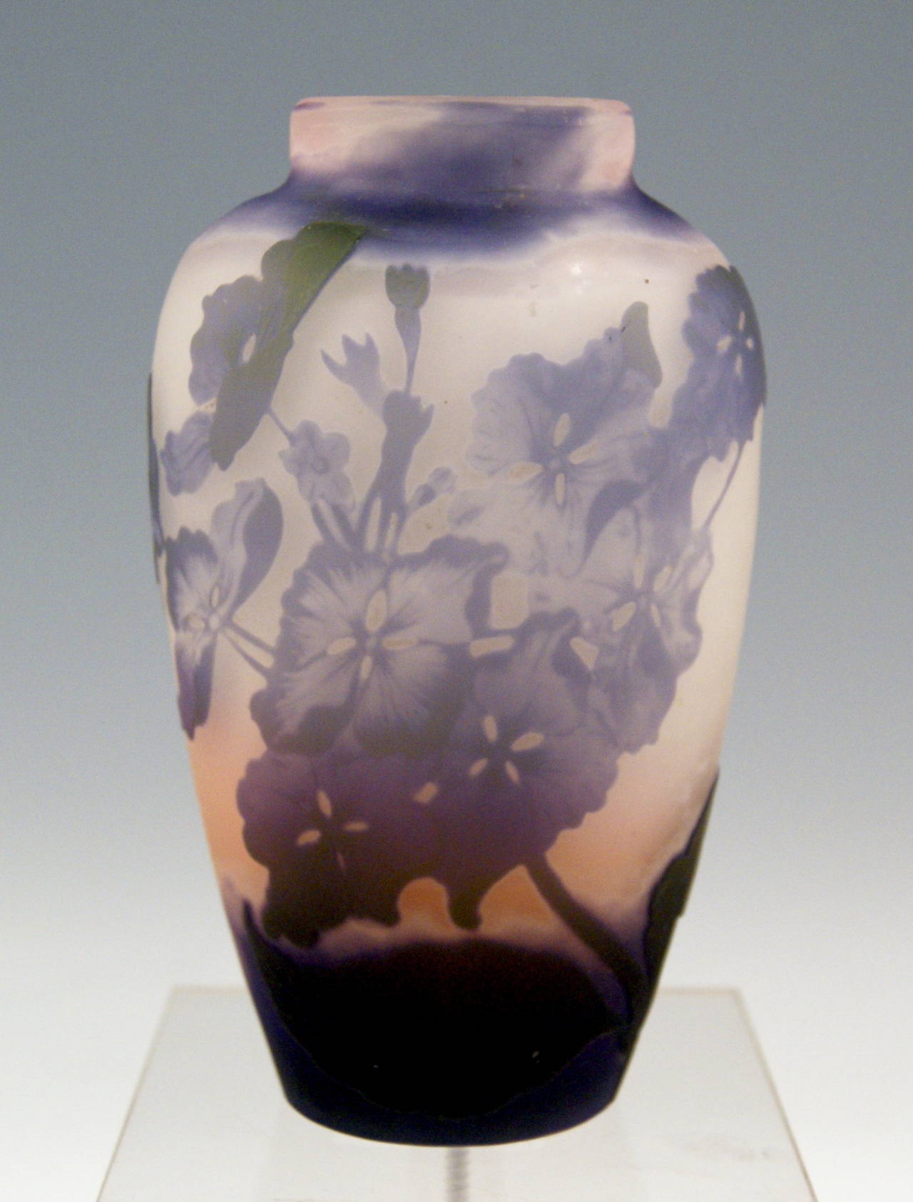 Gallé Nancy Art Nouveau Vase made in France  /  Lorraine, circa 1904 - 06. 
Stunningly manufactured casing glass (violet and rose red & greyish as well as cream shaded).  The bellied vase is of tapering type at area below  /   round plane bottom