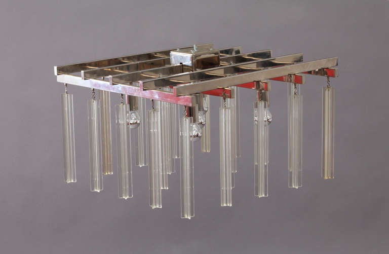 Four amazing square modernist ceiling lamps,
crystal glass and chrome frame.
Five bulbs.
Architect H.Thurnher designed for the Montforthaus.
manufacter Fa. Koch, Austria
Congresshall Feldkirch, Austria, 1972.
12 pieces available.