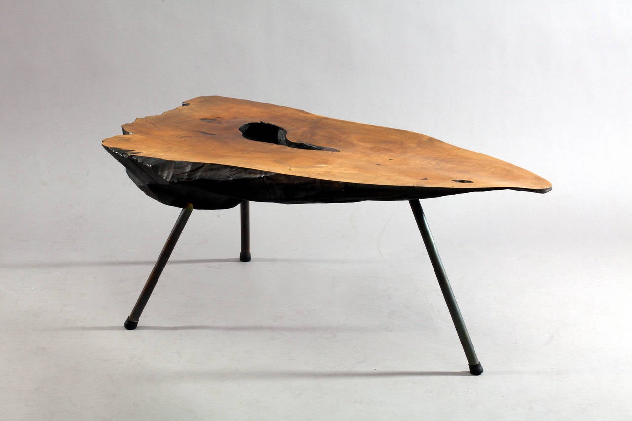tree trunk table
designed Carl Auböck
prod. Auböck Vienna
Austria 1950
solid nut, brass legs.
widht....... 48