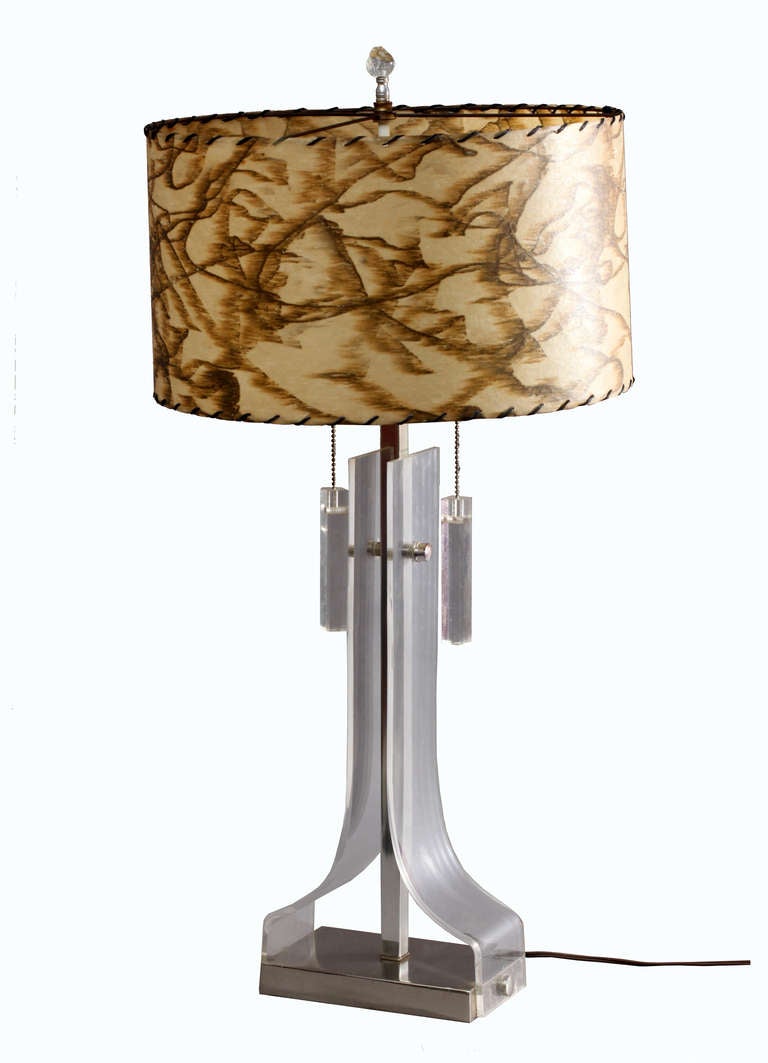 Amazing plexiglass table lamp
1970s Italian
Attributed to Sciolari
chrome/acryl
Single switchable bulbs
Lampshade in painted skin screen.