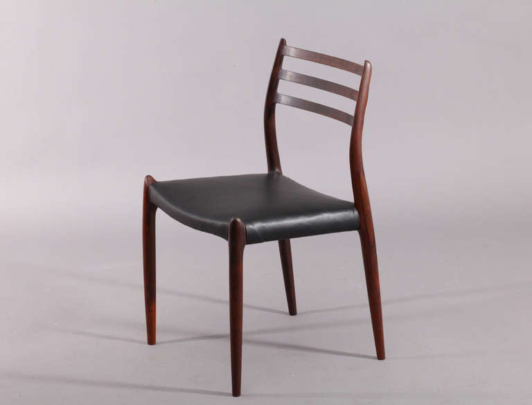 amazing set of 8 dining chairs,
designed by Niels Moeller,
Denmark 1950.
solid Rosewood in organic shape.
black leather.