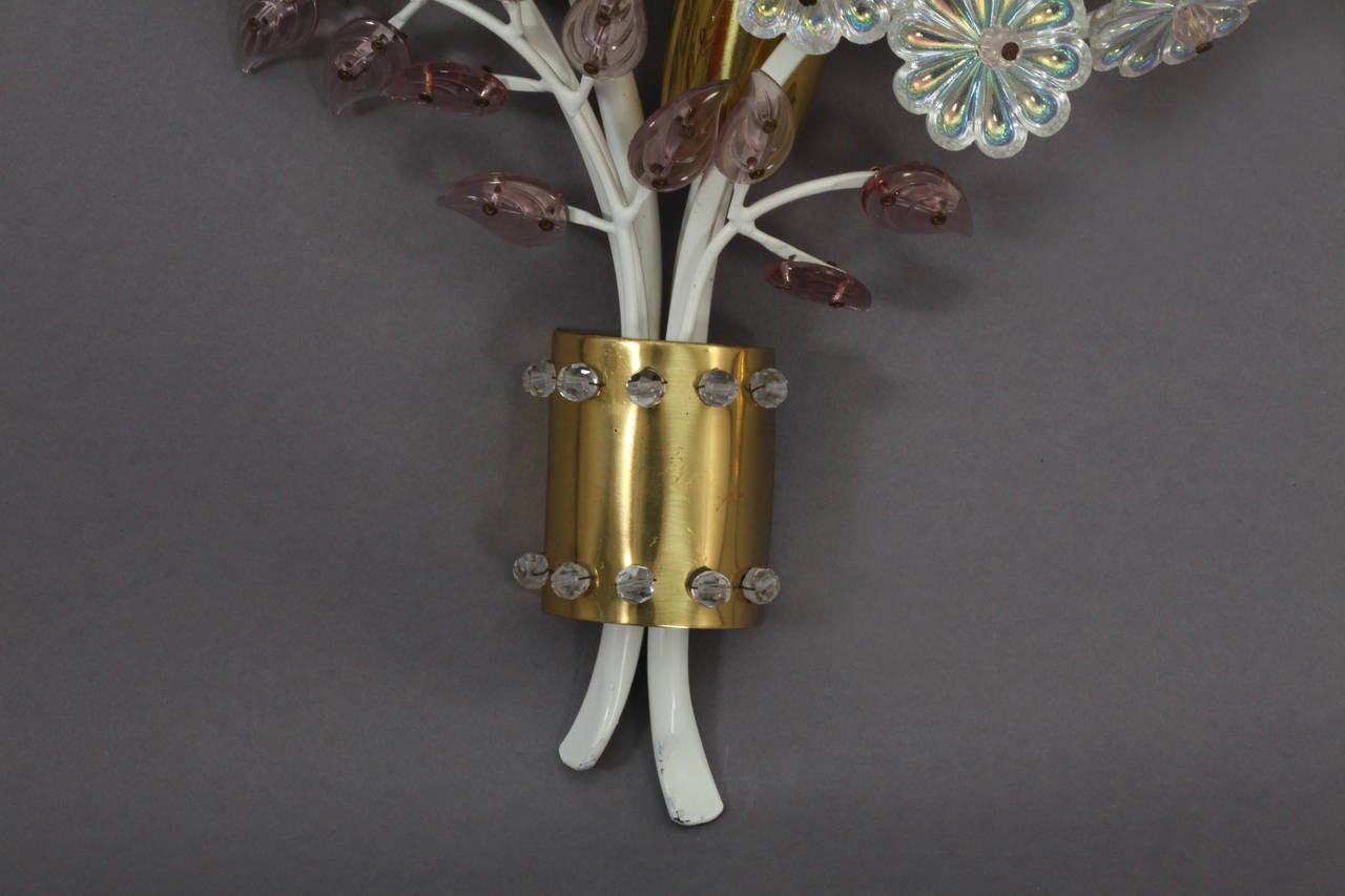 Pair of sconces,
designed Emil Stejnar,
production Rupert Nikoll,
Vienna, 1950.
Glass flowers, brass, lamp sockets.
Dimensions: Height 15 inch (37cm), width 14 inch (35cm), depth 5 (12cm).