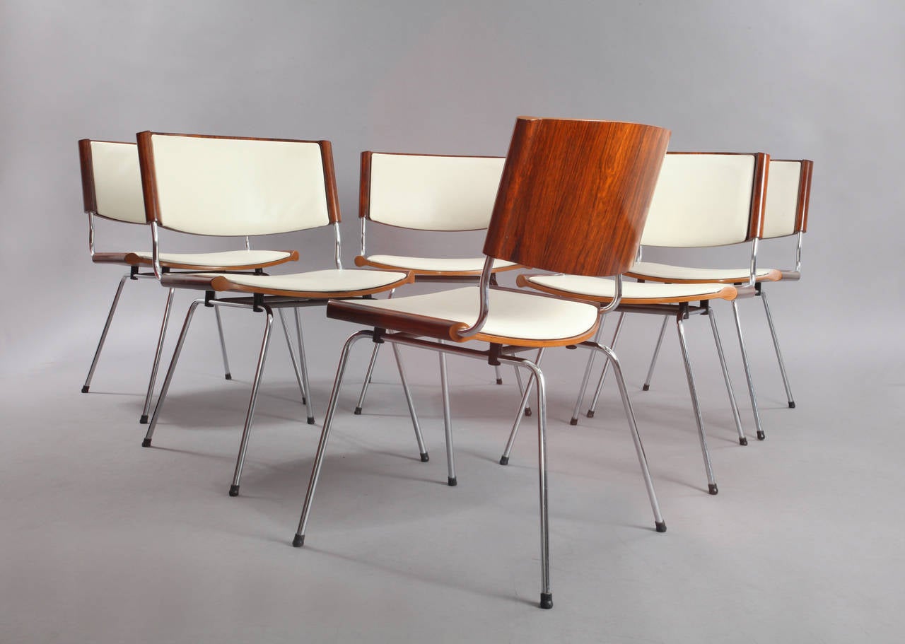 Set of six stacking dining chairs,
designed by Nanna Ditzel,
produced by Kold Sawerks,
Denmark, 1958.
Rosewood, sand-colored leather.
Height 28 inch (72cm),
width 16 inch (41cm),
depth 20 inch (51cm).

Shipping costs to US ....$ 600.