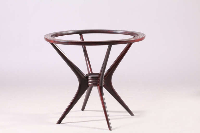 round coffeetable,
designed Cesare Lacca,
Italy 1950,
organic shape,
solid mahagoni-dark Brown-roung glass plate
Diameter 23,6