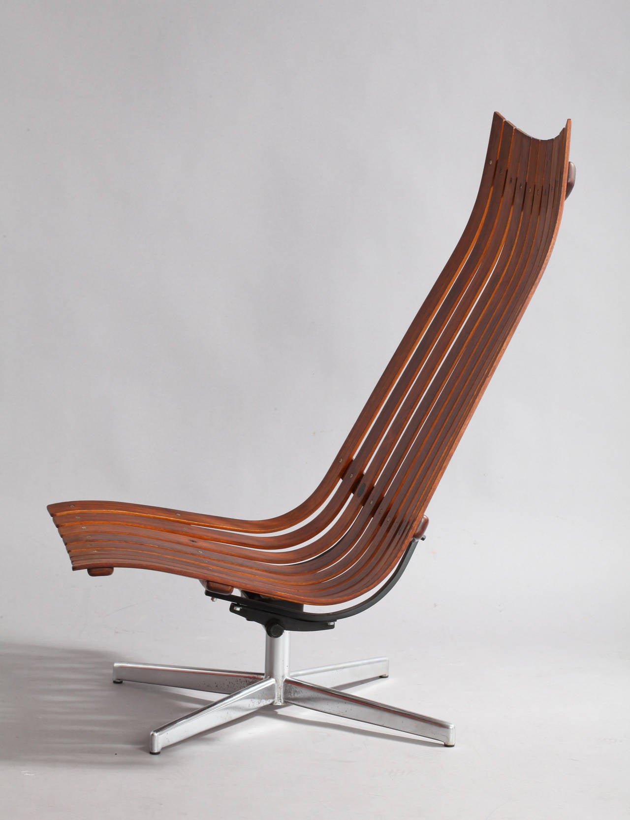 Very rare Hans Brattrud rosewood swivel lounge chair 
