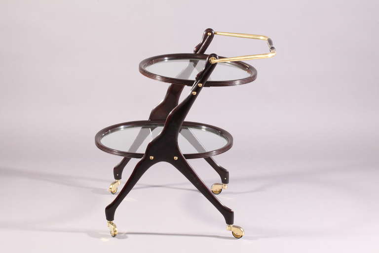 mid century bar cart,
designed Cesare Lacca,
Italy 1950.
solid walnut ebonized,
brass wheels and handle grip.
widht 30