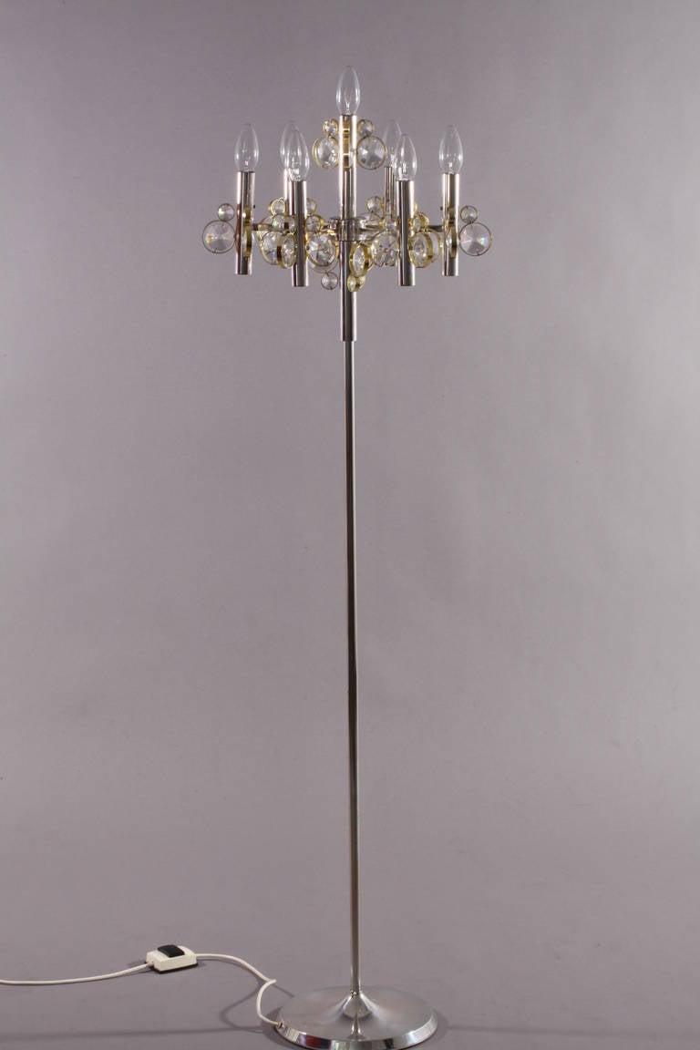 Amazing floor lamp
Crystal glass,
Attributed by Lobmeyr,
Vienna, 1970.
Chromed base,
Seven bulbs,
Measures: height 60 inch, diameter 18 inch.