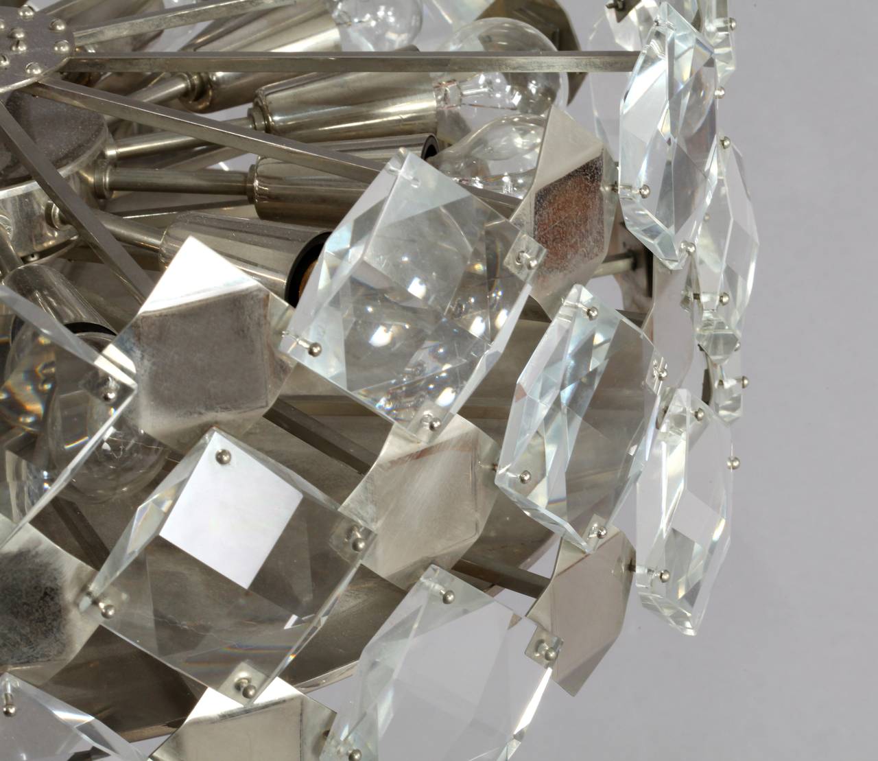 Silver plated chandelier.
Manufacted bakalowits and Söhne,
Vienna, 1960,
Faceted crystal glass.